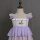 Hot sale purple embroidered chiffon fabric smocked ruffle dress